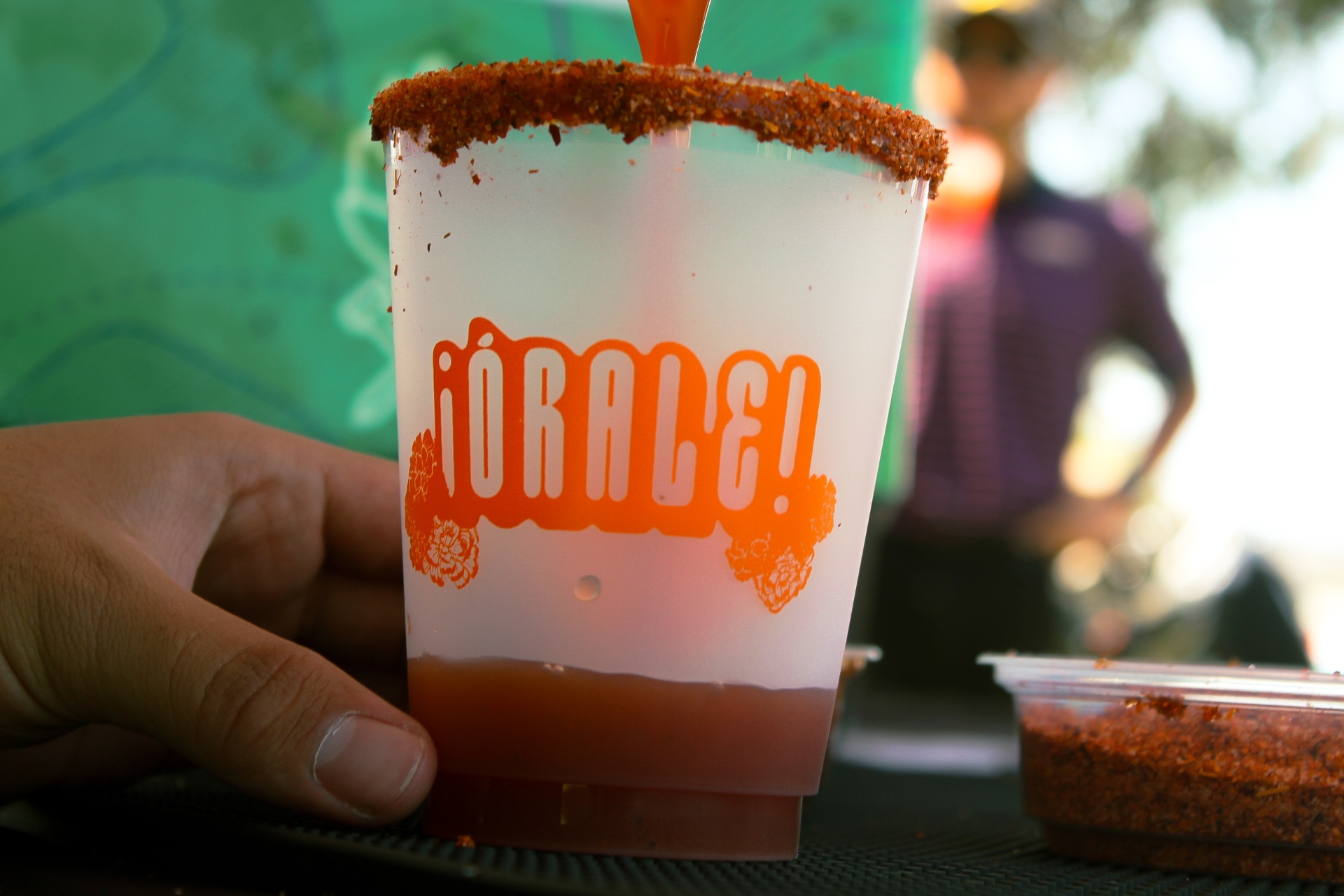 Órale cup with a chamoy and tajín rim