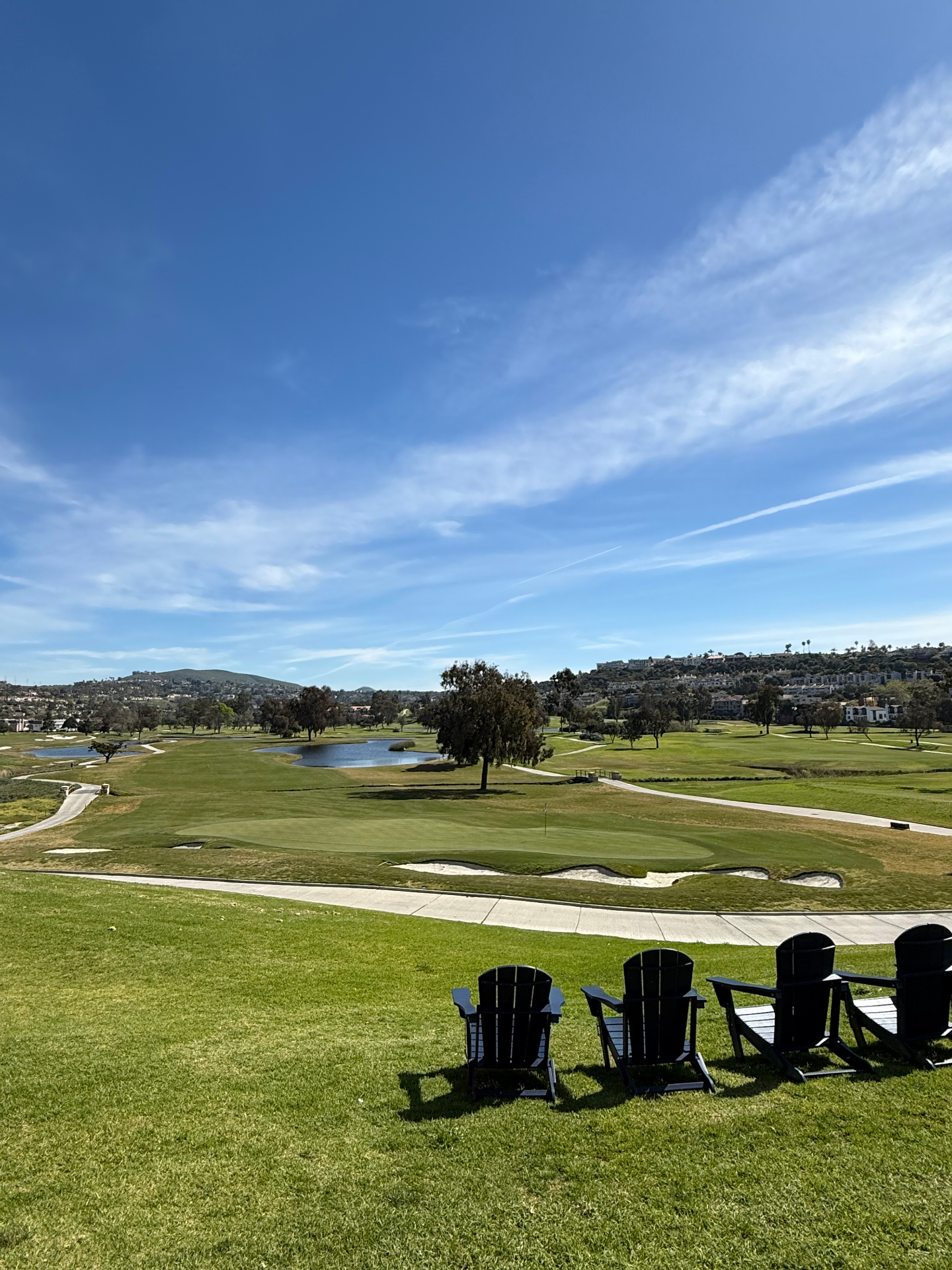 View over Emerald Isle Golf Course from Adirondack chairs